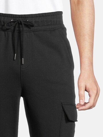 AÉROPOSTALE - Tapered Calças cargo 'HYBRID' em preto