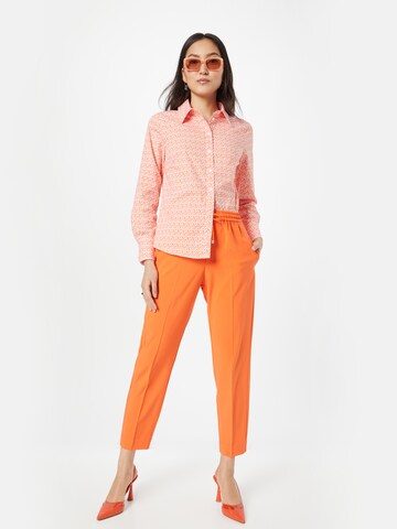 InWear - Tapered Pantalón de pinzas 'Adian' en naranja