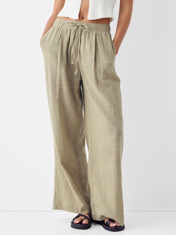 Bershka Wide leg Pants in Beige: front