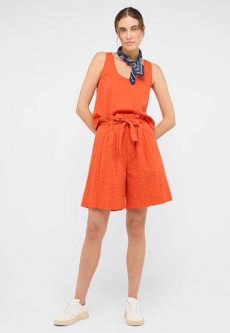MUSTANG Loose fit Trousers in Orange