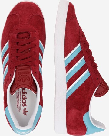 Baskets basses 'Gazelle' ADIDAS ORIGINALS en rouge