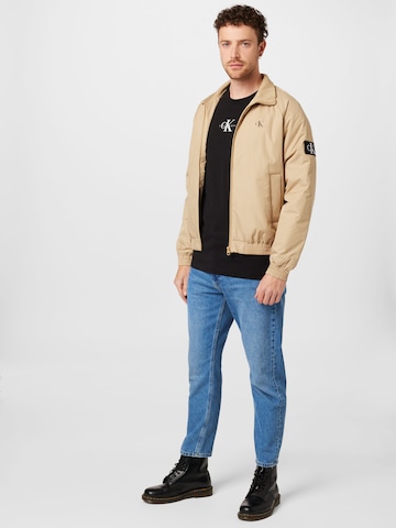 Calvin Klein Jeans Φθινοπωρινό και ανοιξιάτικο μπουφάν 'Harrington' σε μπεζ