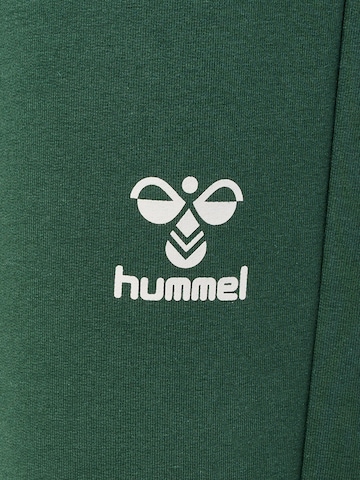 Regular Pantaloni sport de la Hummel pe verde