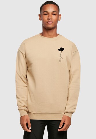 Merchcode Sweatshirt 'Love In The Air' in Beige: voorkant