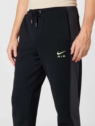 Nike SportswearTapered Hlače - crna boja