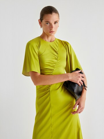 Scalpers Dress in Green: front