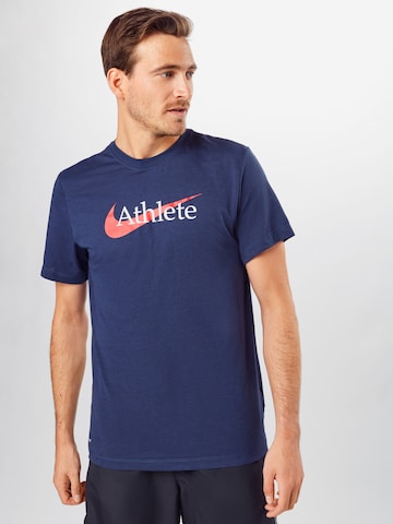 Coupe regular T-Shirt fonctionnel NIKE en bleu : devant