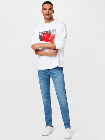 Maglietta 'DISRUPTED' di Calvin Klein Jeans in bianco