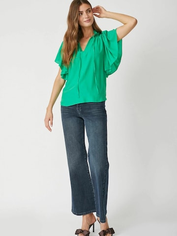 Maglietta di co'couture in verde
