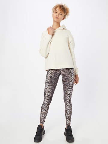 Athlecia Skinny Sports trousers 'Windia' in Brown