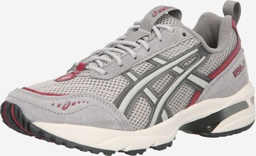 Baskets basses ASICS SportStyle en gris : devant