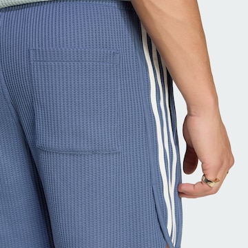 ADIDAS ORIGINALS Loosefit Nadrág 'Sprinter' - kék