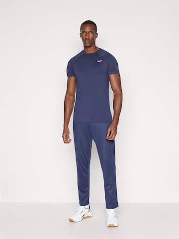 Reebok Funkčné tričko 'ARNIE' - Modrá