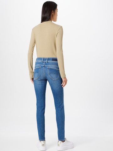 Coupe slim Jean Salsa Jeans en bleu