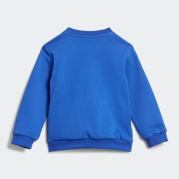 ADIDAS SPORTSWEAR - Skinny Chándal 'Badge Of Sport French Terry' en azul