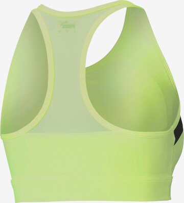 PUMA Bustier Sport-BH in Gelb