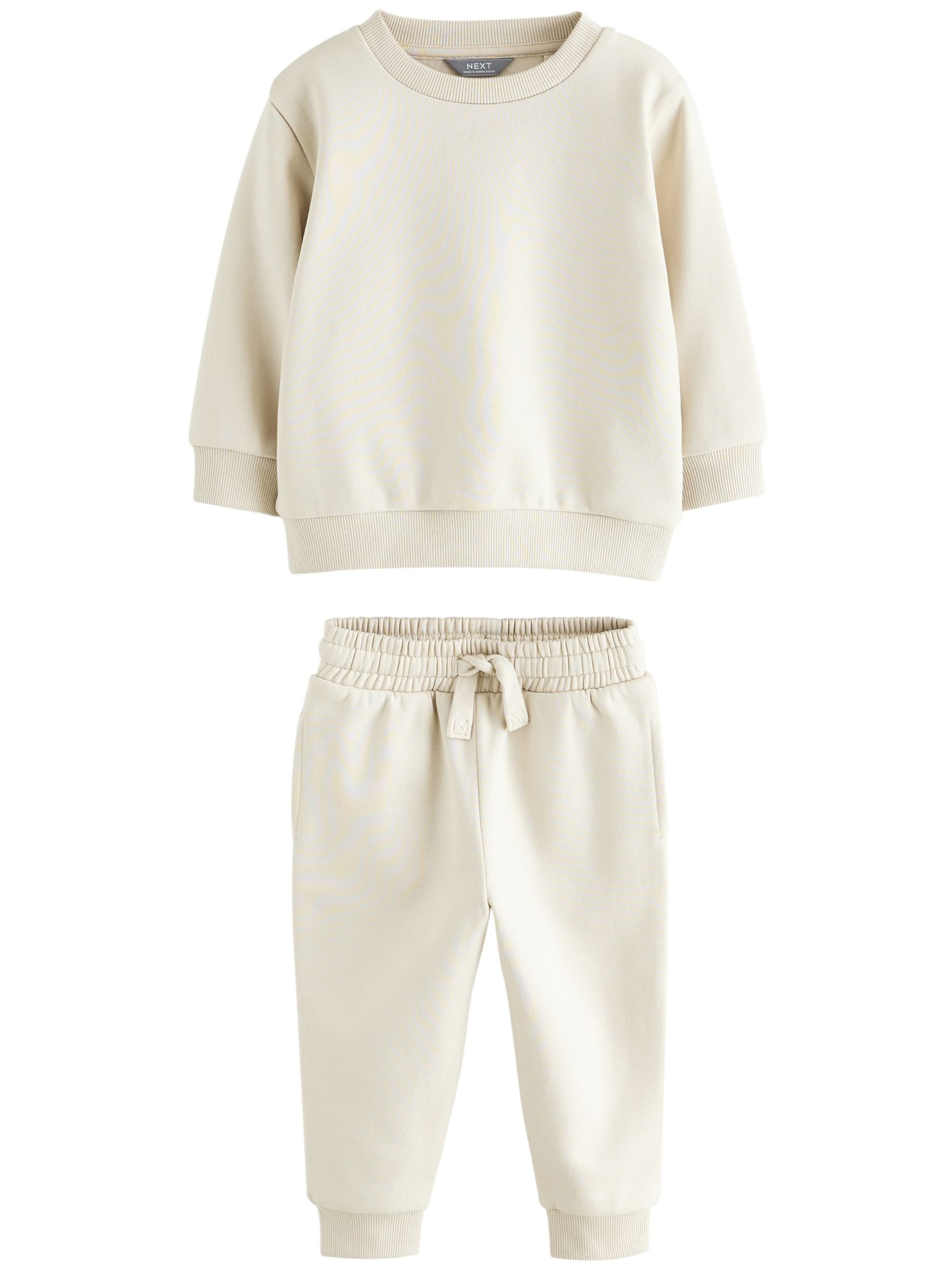 Next Облекло за бягане в бежово: отпред