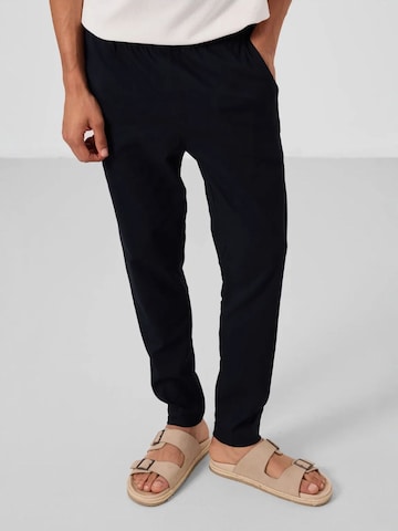 Pantalon Tommy Life en noir : devant