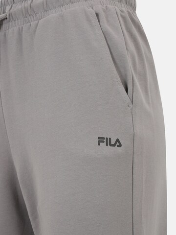 FILA Tapered Urheiluhousut värissä lila
