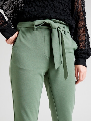 VERO MODA Zúžený Kalhoty – zelená