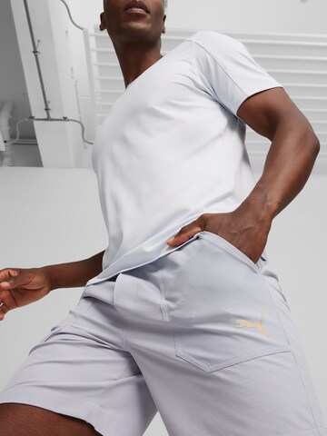 PUMA Štandardný strih Športové nohavice 'Concept 8' - Sivá