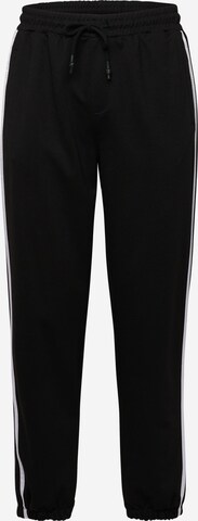 Trendyol Tapered Pants in Black: front