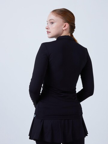 SPORTKIND Funktionsshirt 'Poloshirt Langarm'‌‌‌‌‌‌ in Schwarz