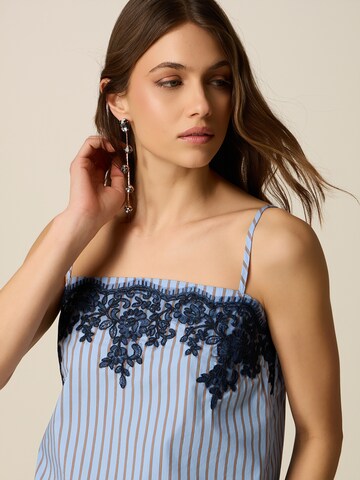 Camicia da donna di oltre in blu