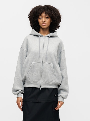 Nike Sportswear - Casaco em moletão em cinzento: frente