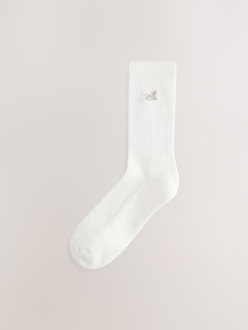 self. Socks in White