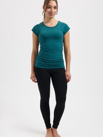 Urban Goddess Yoga & Activewear Sporttop 'Zefira Yoga & Pilates' in Grün