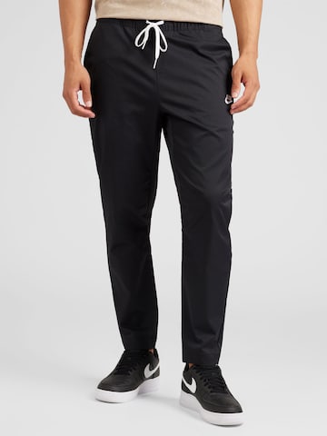 Regular Pantaloni de la Nike Sportswear pe negru: față