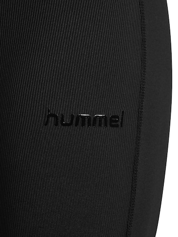 évasé Pantalon de sport Hummel en noir