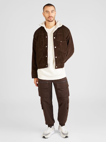 LEVI'S ® Overgangsjakke 'Type 1 Sherpa Trucker Corduroy Jacket' i brun