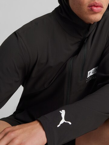 PUMA Спортивная куртка 'Ultraweave Hooded' в Черный