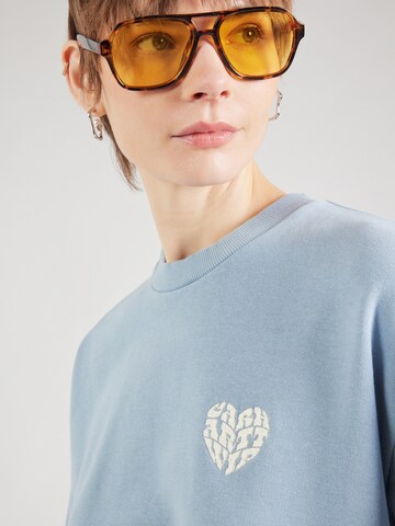 Carhartt WIP - Sudadera 'Productions' en azul