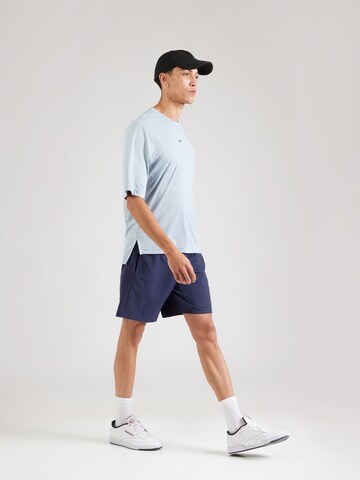 Reebok - Camiseta funcional en azul