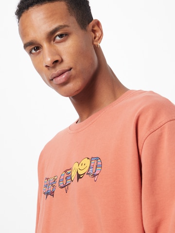 Sweat-shirt 'Kai' by Jannik Stutzenberger' ABOUT YOU Limited en orange