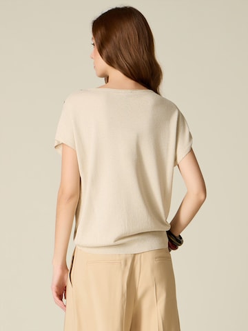 Pullover di oltre in oro