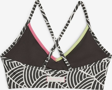 Bustino Reggiseno sportivo di PUMA in nero