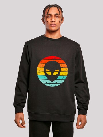 Sweat-shirt 'Alien Retro Sonnenuntergang' F4NT4STIC en noir : devant