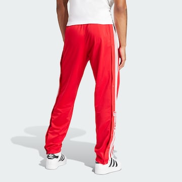 ADIDAS ORIGINALS Normalny krój Spodnie 'Adicolor Classics Adibreak' w kolorze czerwony