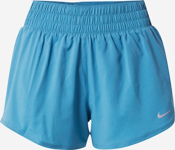 Pantaloni sport de la NIKE pe albastru: față