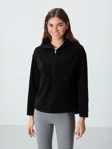 Tommy Life - Sweatshirt em preto: frente