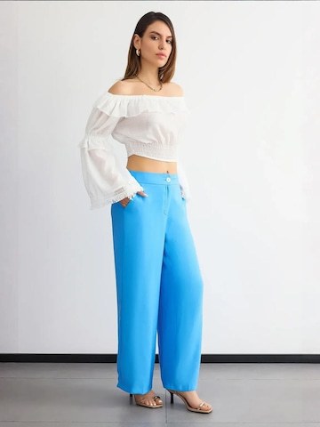 Hiccup - Perna larga Calças em azul