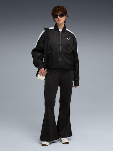 PUMA Regular Sporthose 'Puma Wardrobe Ess Flared Pants'‌ in Schwarz