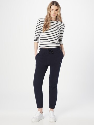 Tapered Pantaloni de la TOMMY HILFIGER pe negru