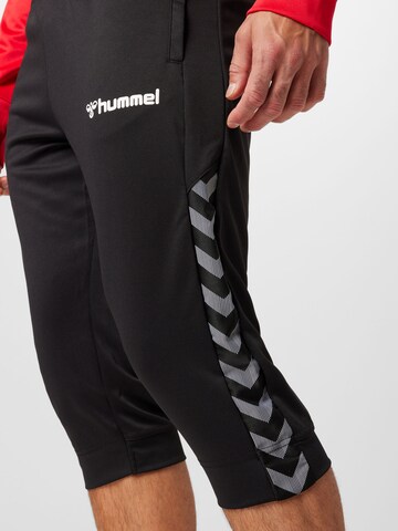 Hummel Slim fit Sports trousers in Black
