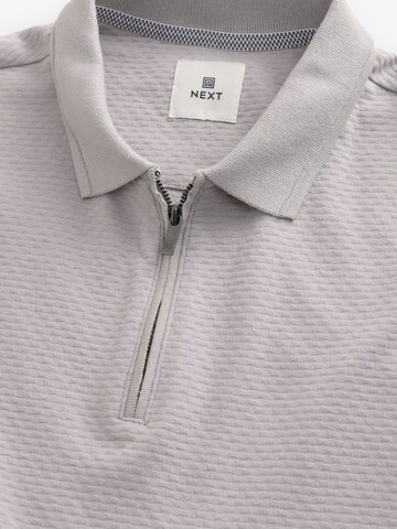 T-Shirt Next en gris