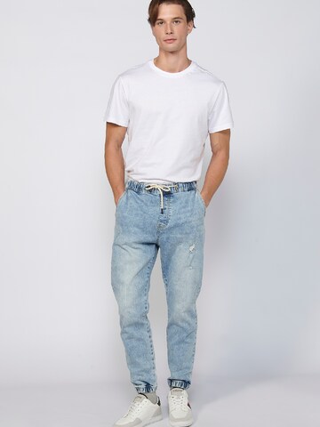 KOROSHI Tapered Jeans in Blau